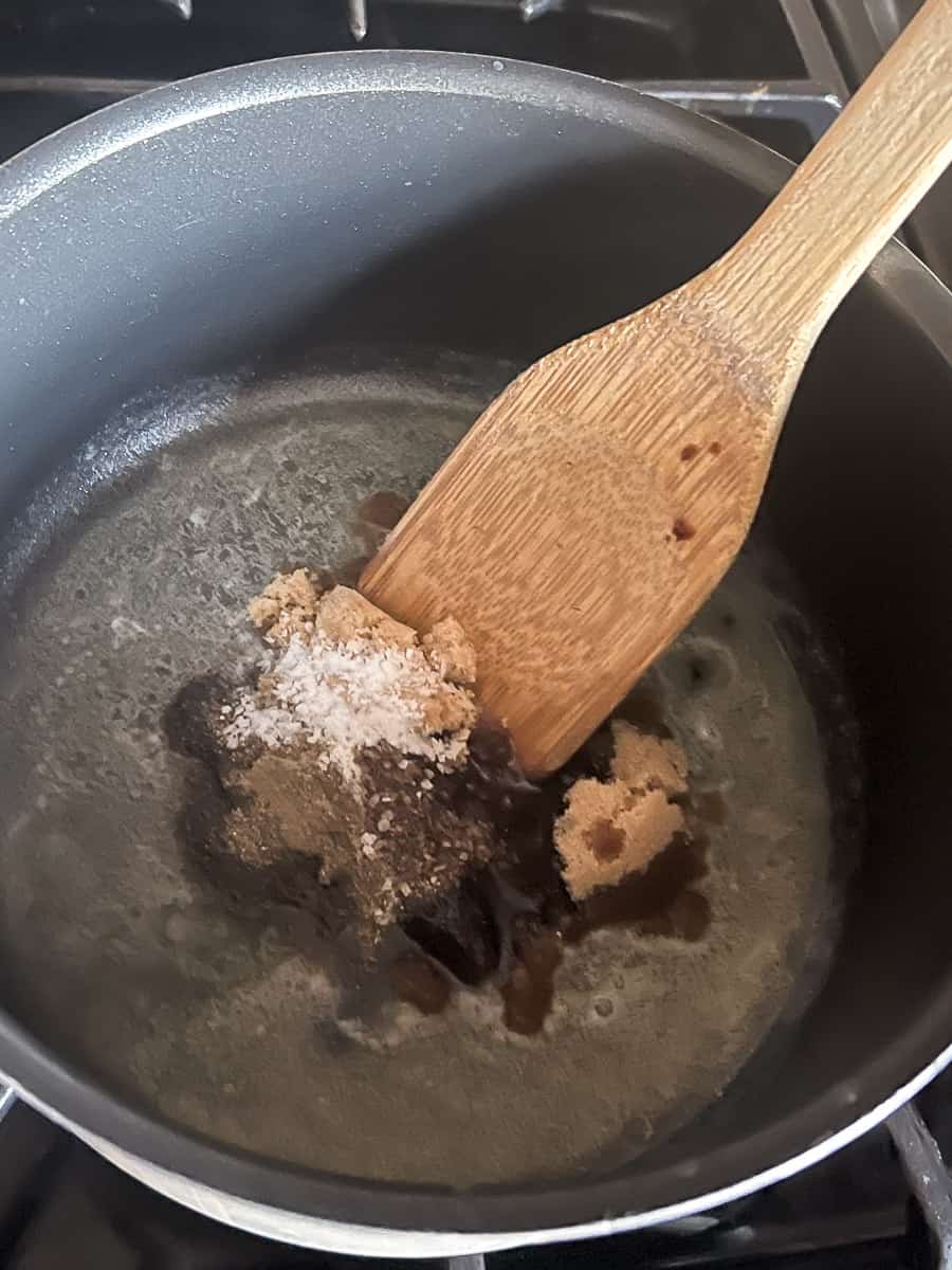 In the saucepan add brown sugar, soy sauce, salt and pepper.