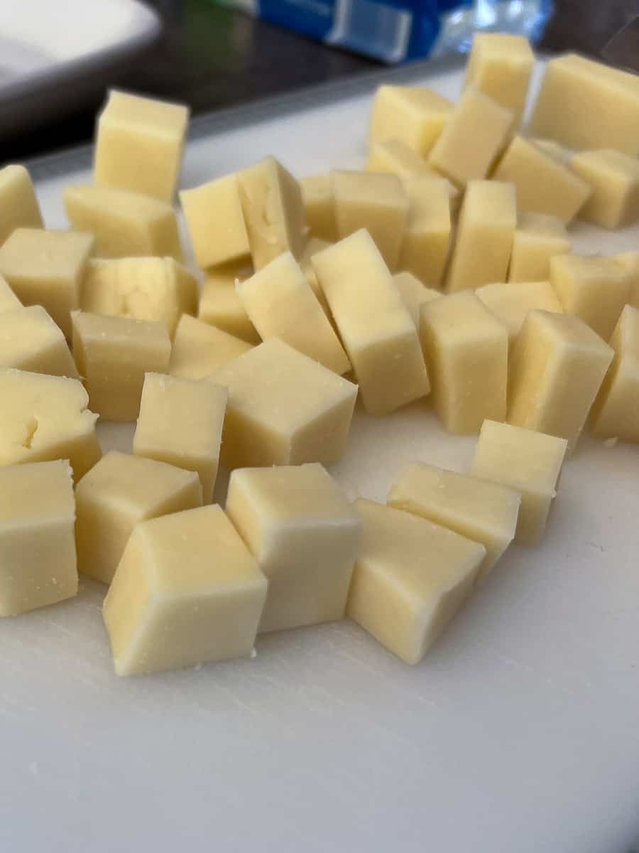 Dice up mozzarella cheese into cubes
