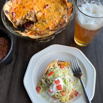 Taco Pie with Tortillas served with salsa and a beer.