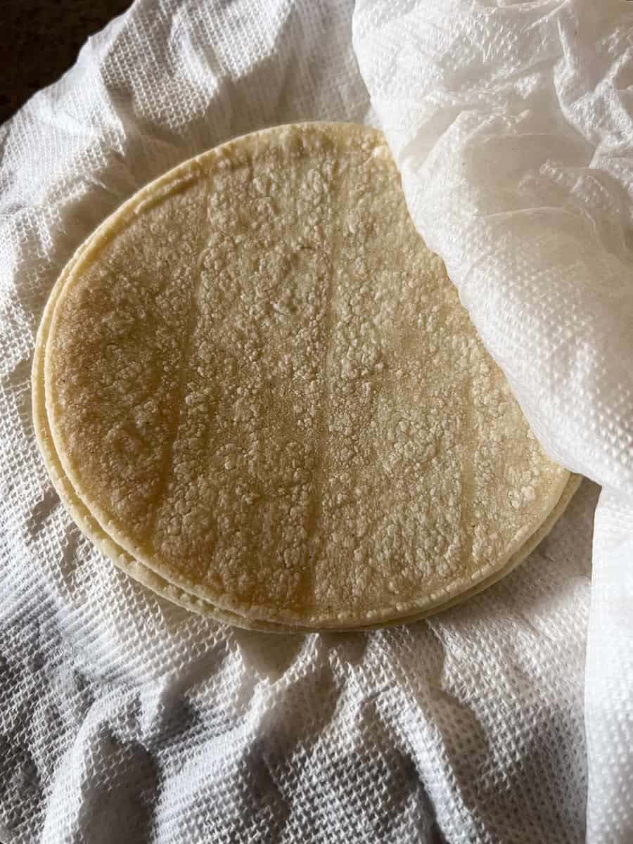 damp paper towels with warmed corn tortillas. 