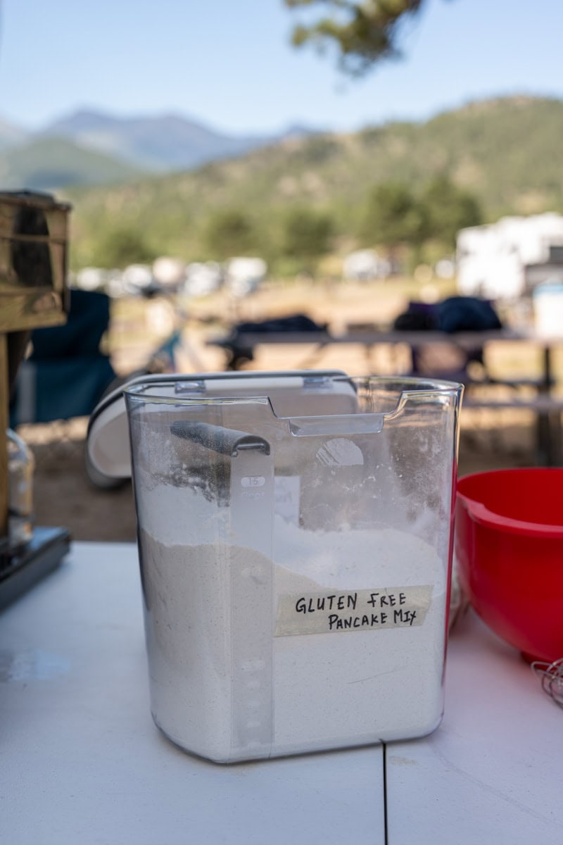pancake mix being used while camping in the mountains.