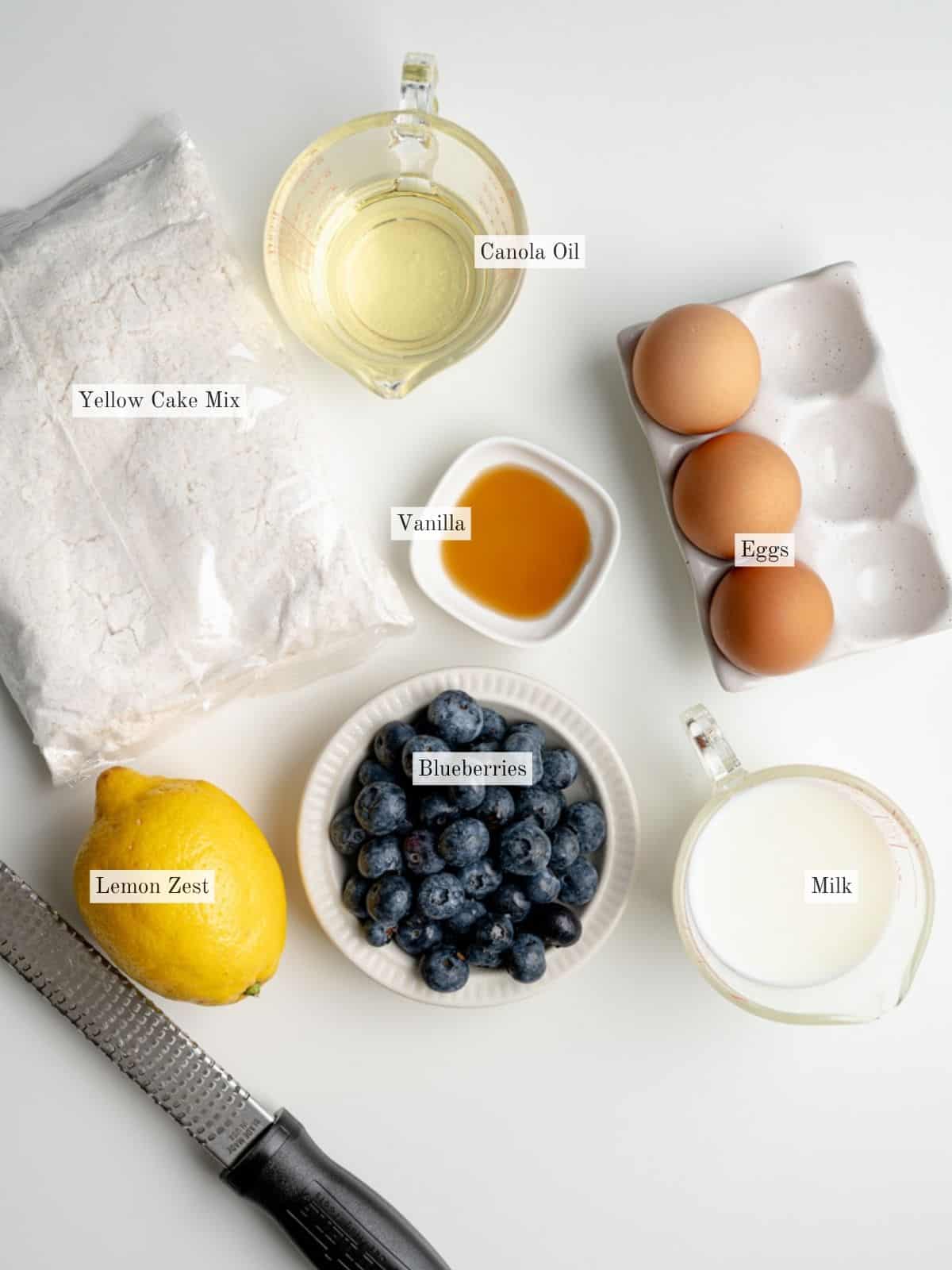 ingredients to make blueberry muffins using a cake mix.