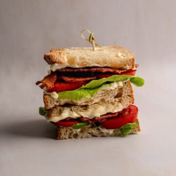 stacked BLT made with cottage bacon, tomatoes and lettuce.
