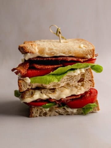 stacked BLT made with cottage bacon, tomatoes and lettuce.