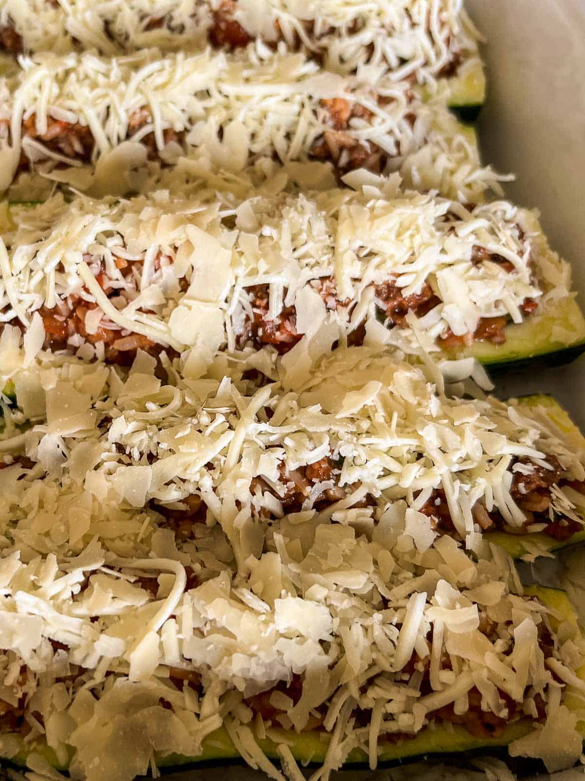 cheese topped zucchini halves. 