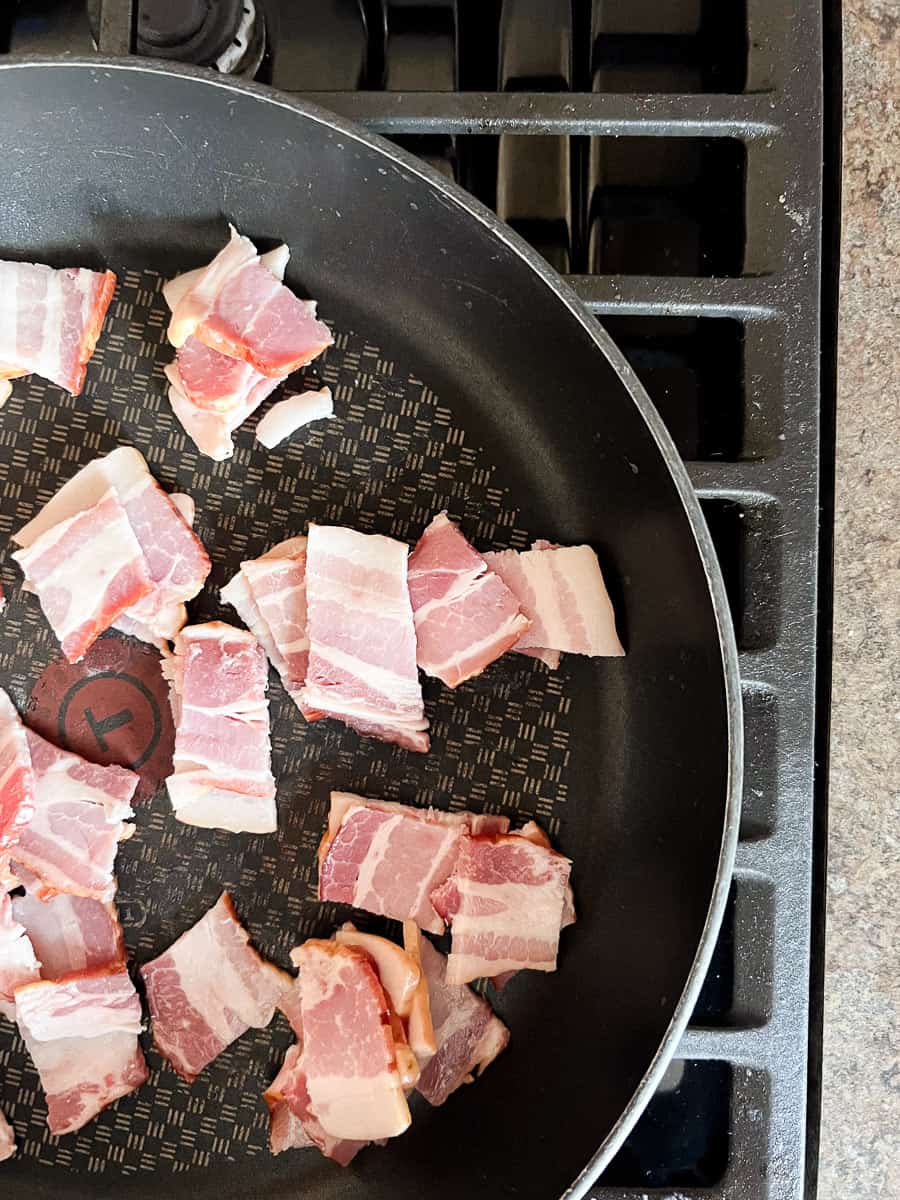 bacon pieces on a large skillet. 