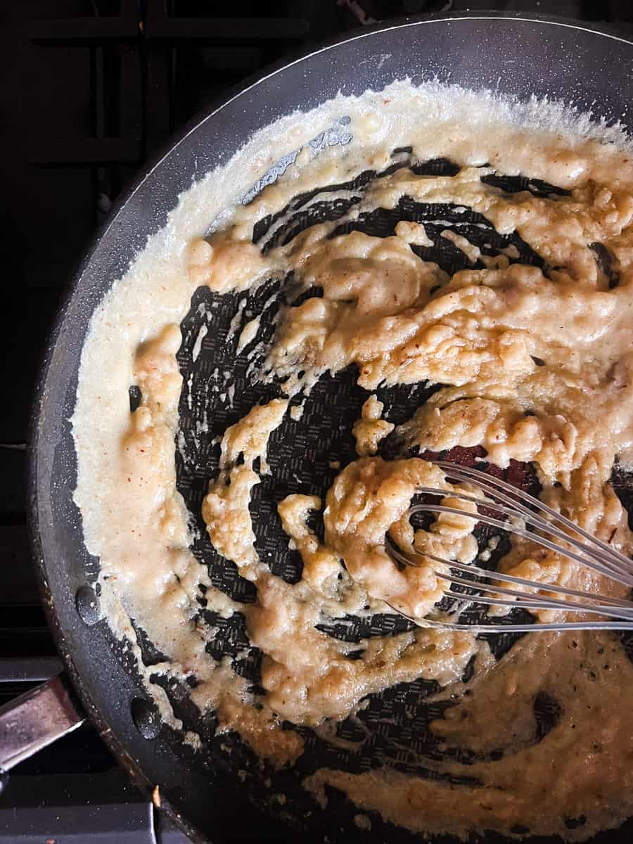 flour and butter in a large skillet with a flat whisk.