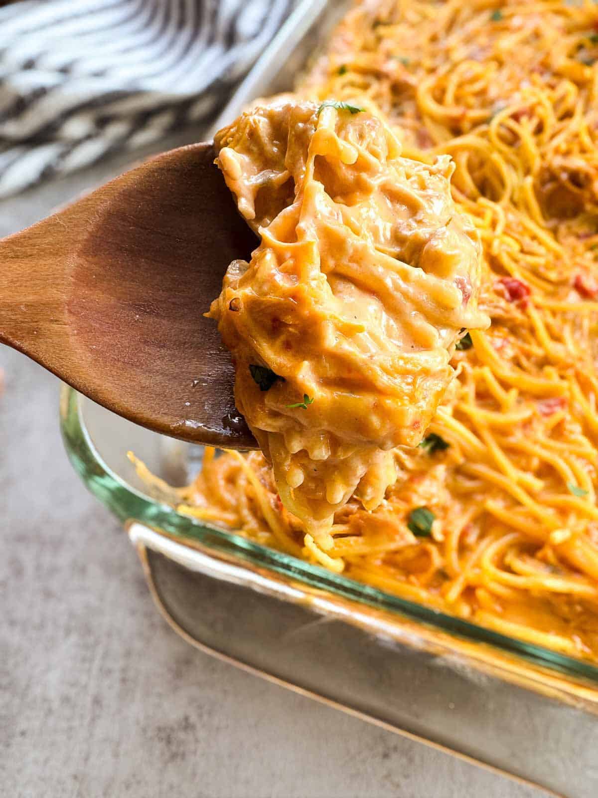 wooden spoonful of chicken spaghetti.