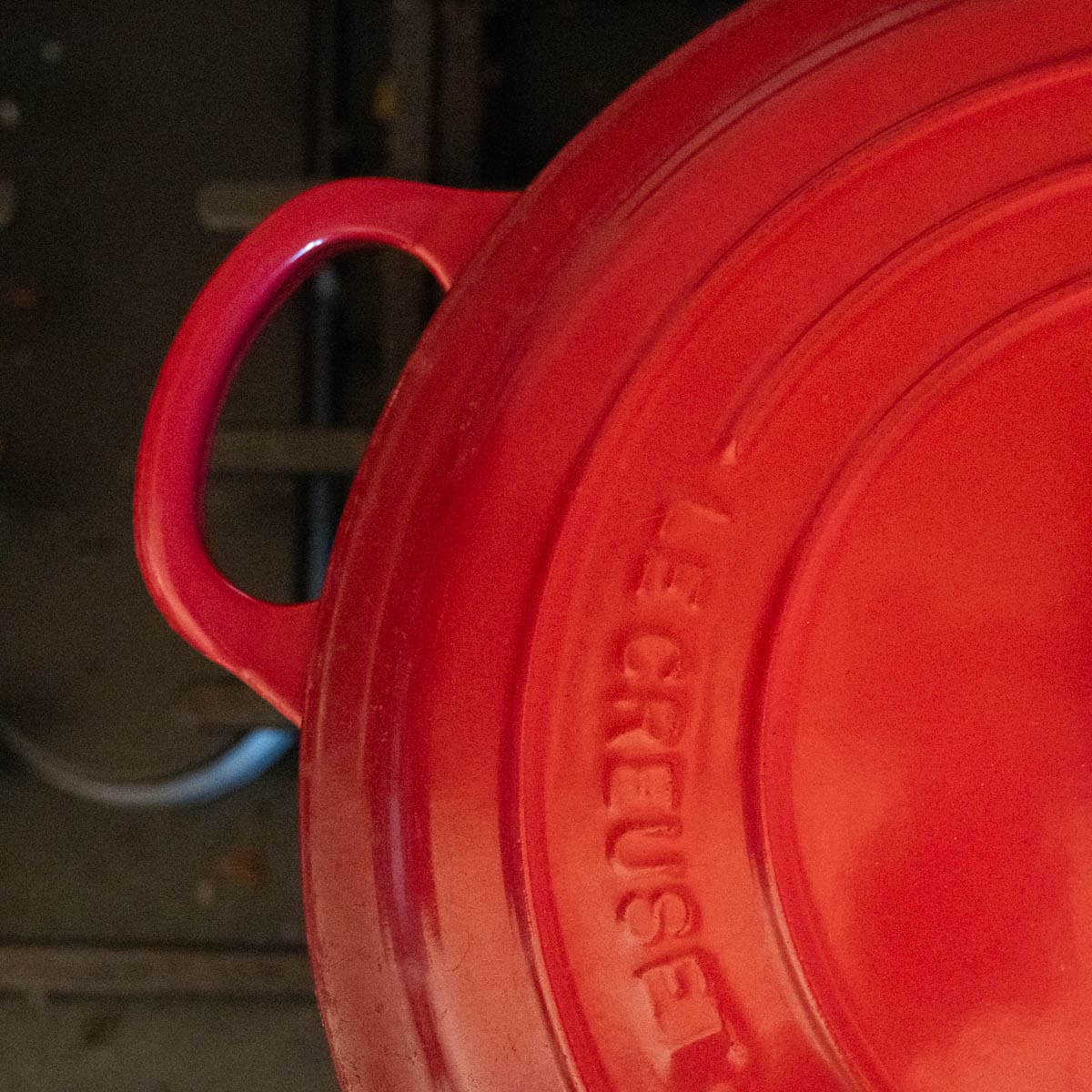 red dutch oven cover on the pot.