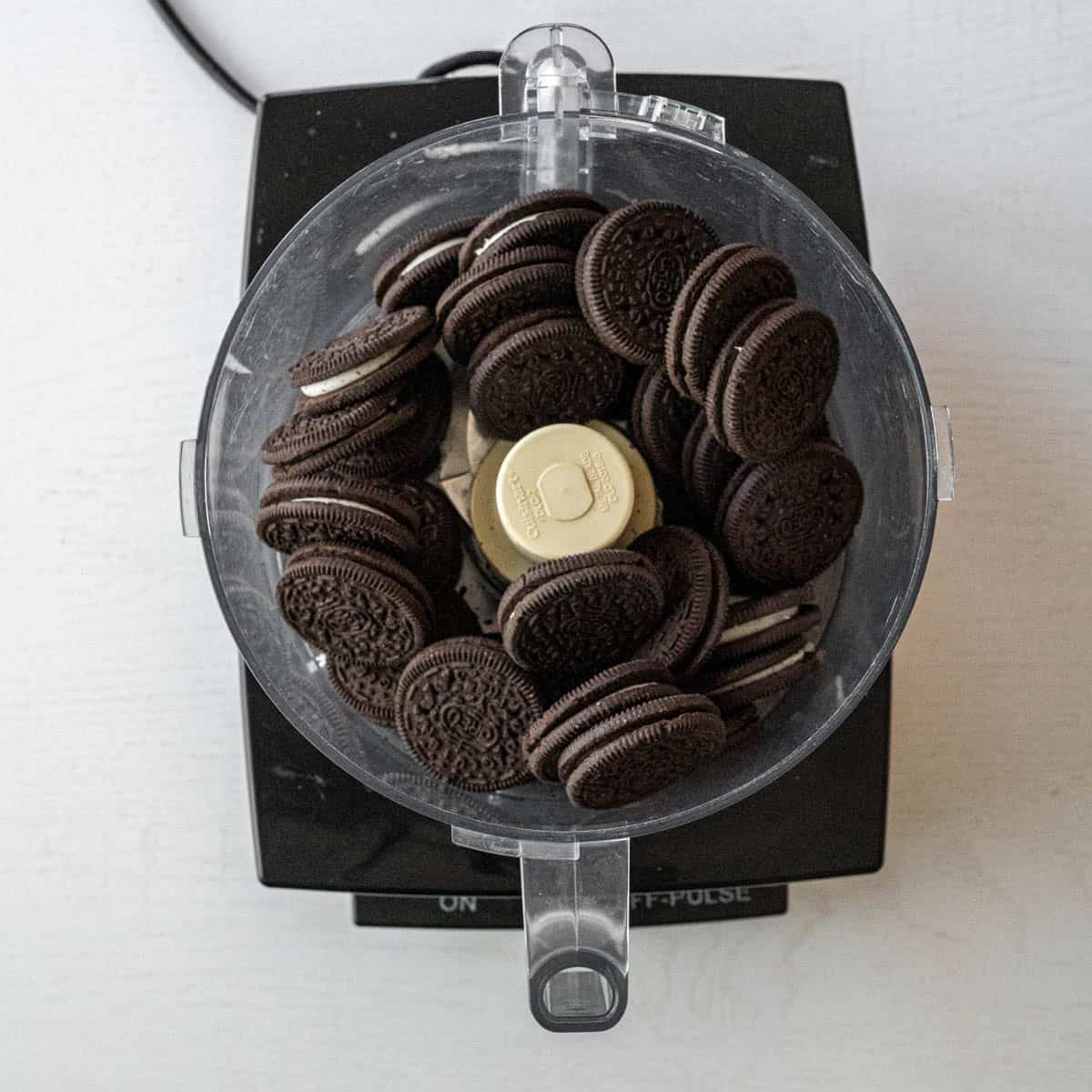 oreos in a food proccesor before crumbling.