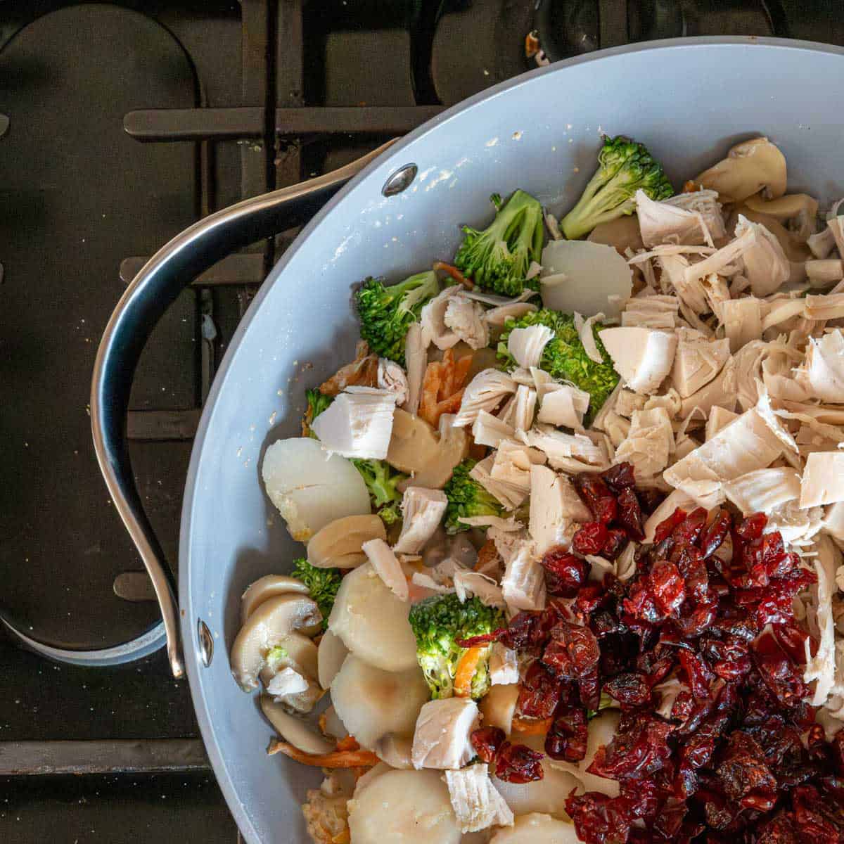 skillet with all the ingredients on the stove top.