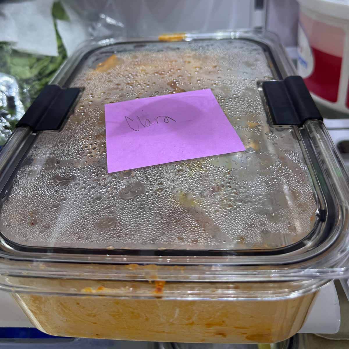 post it note labelling leftovers in the refrigerator.