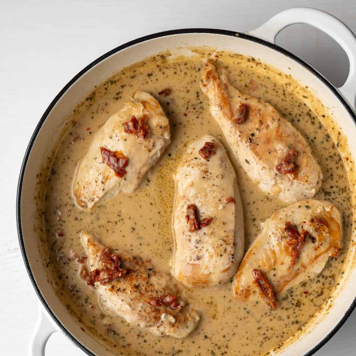 chicken back into the pan with the sauce before baking.