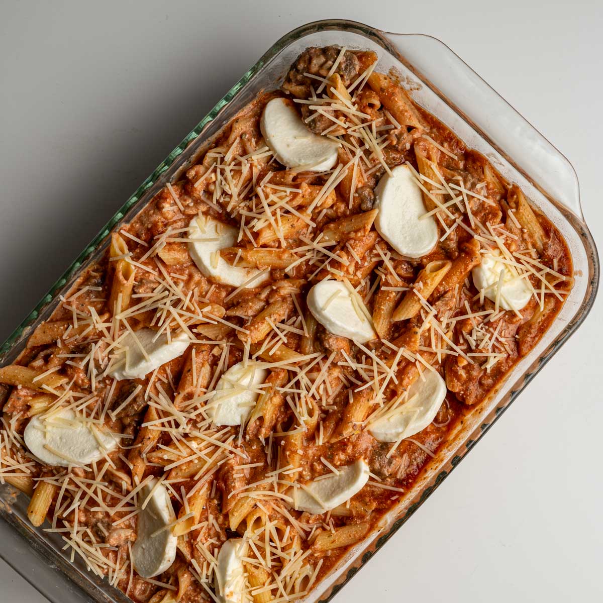 unbaked baked ziti in a casserole pan.