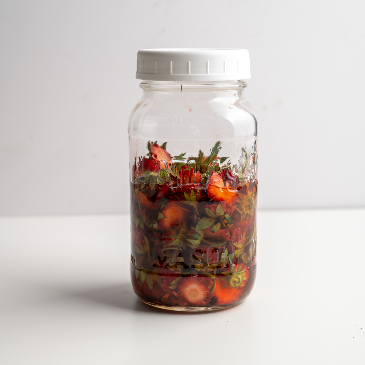 infused vinegar in a mason jar after 2 days.