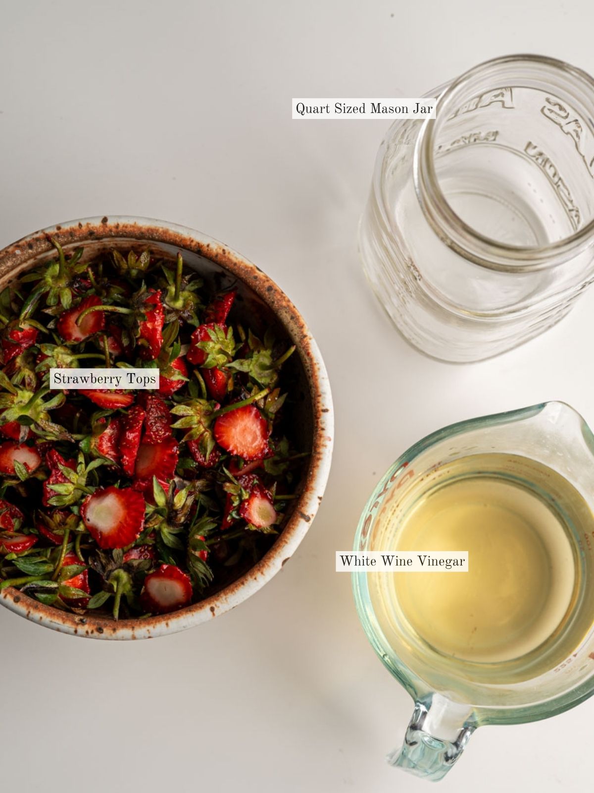 ingredients to make strawberry top vinegar.