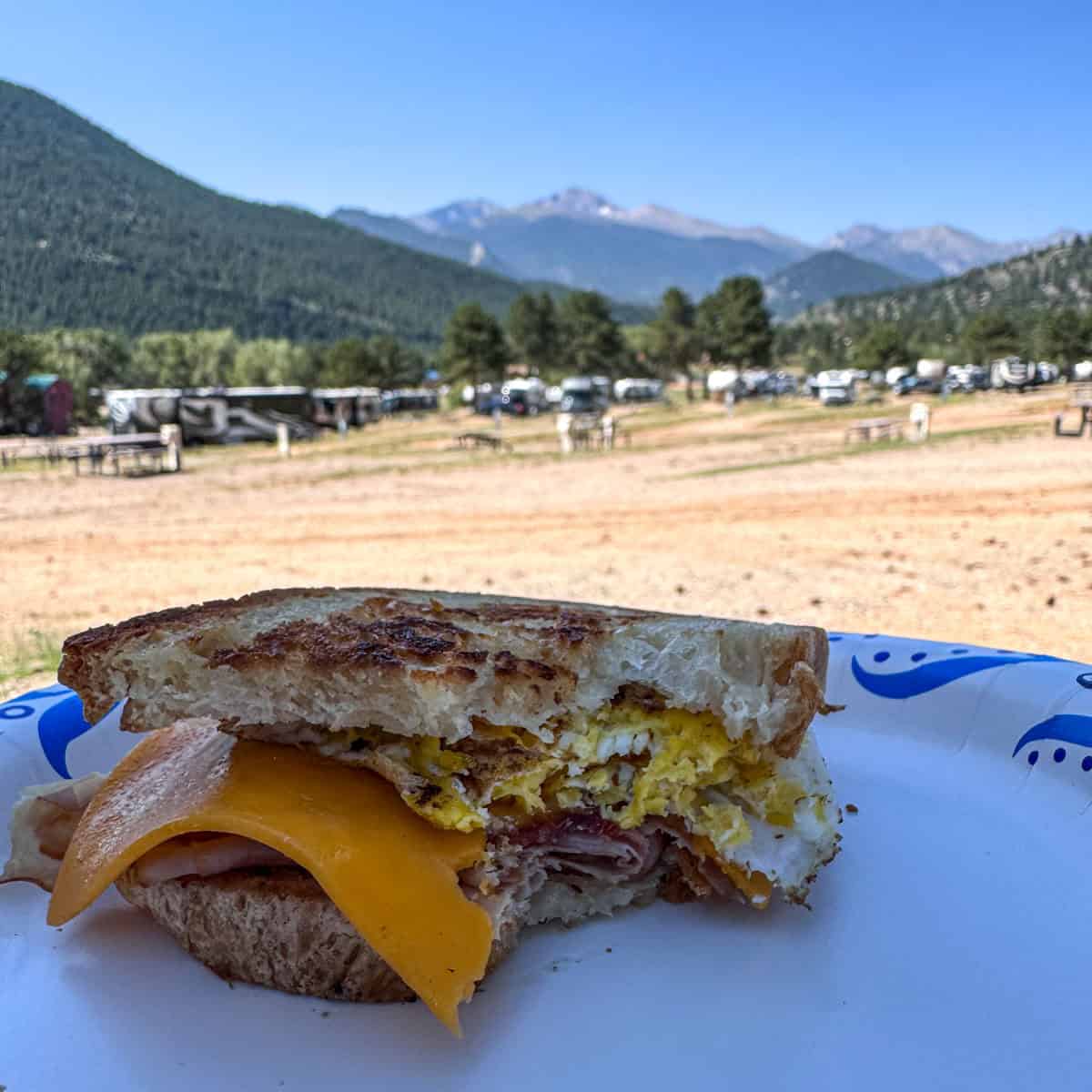 gluten free breakfast sandwich on a papper plate.