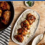 platter of four apricot chicken thighs on a bed of white rice.