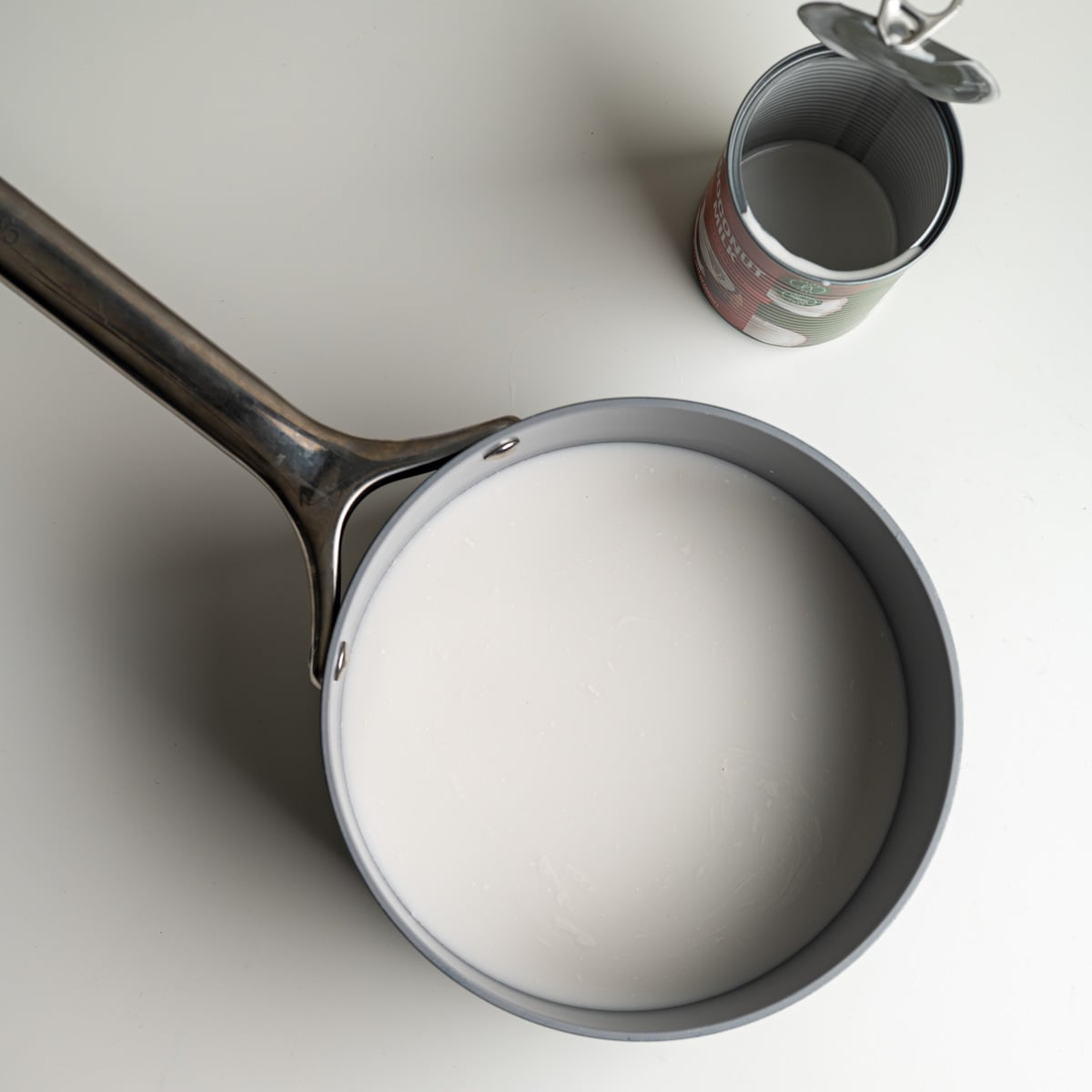 saucepan with water and coconut milk.