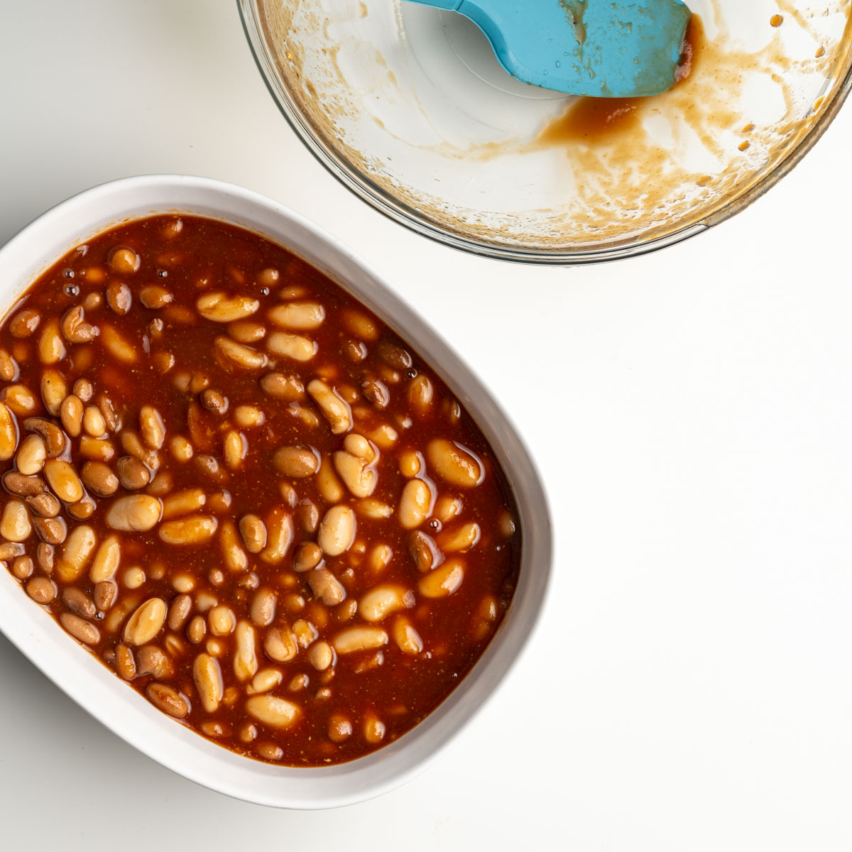 baked bean mixture into a white baking dish.