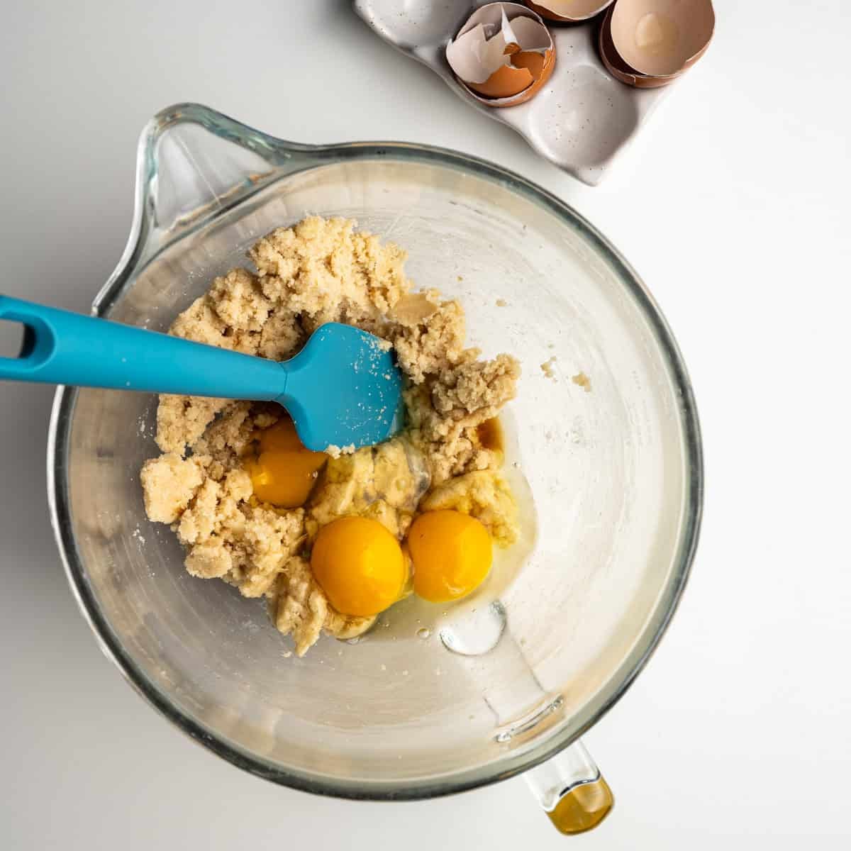 creamed butter with three whole eggs and vanilla.