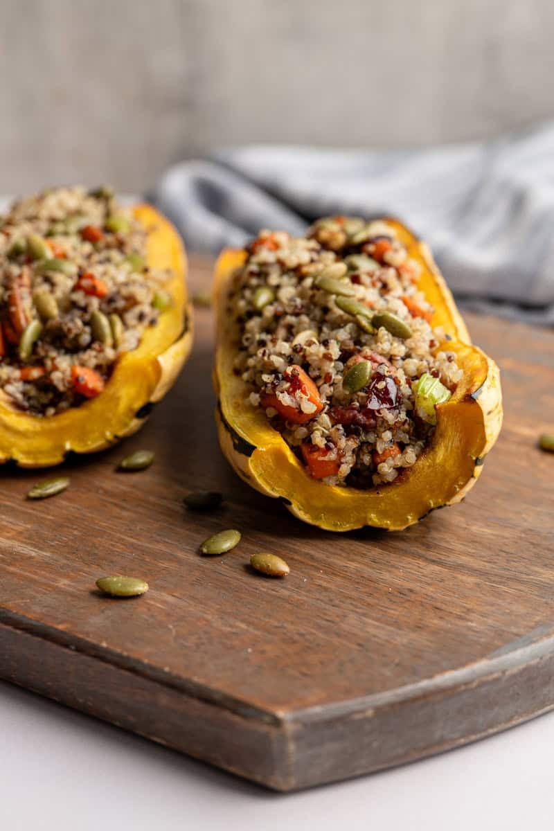 close up of one delicata squash stuffed with quinoa.