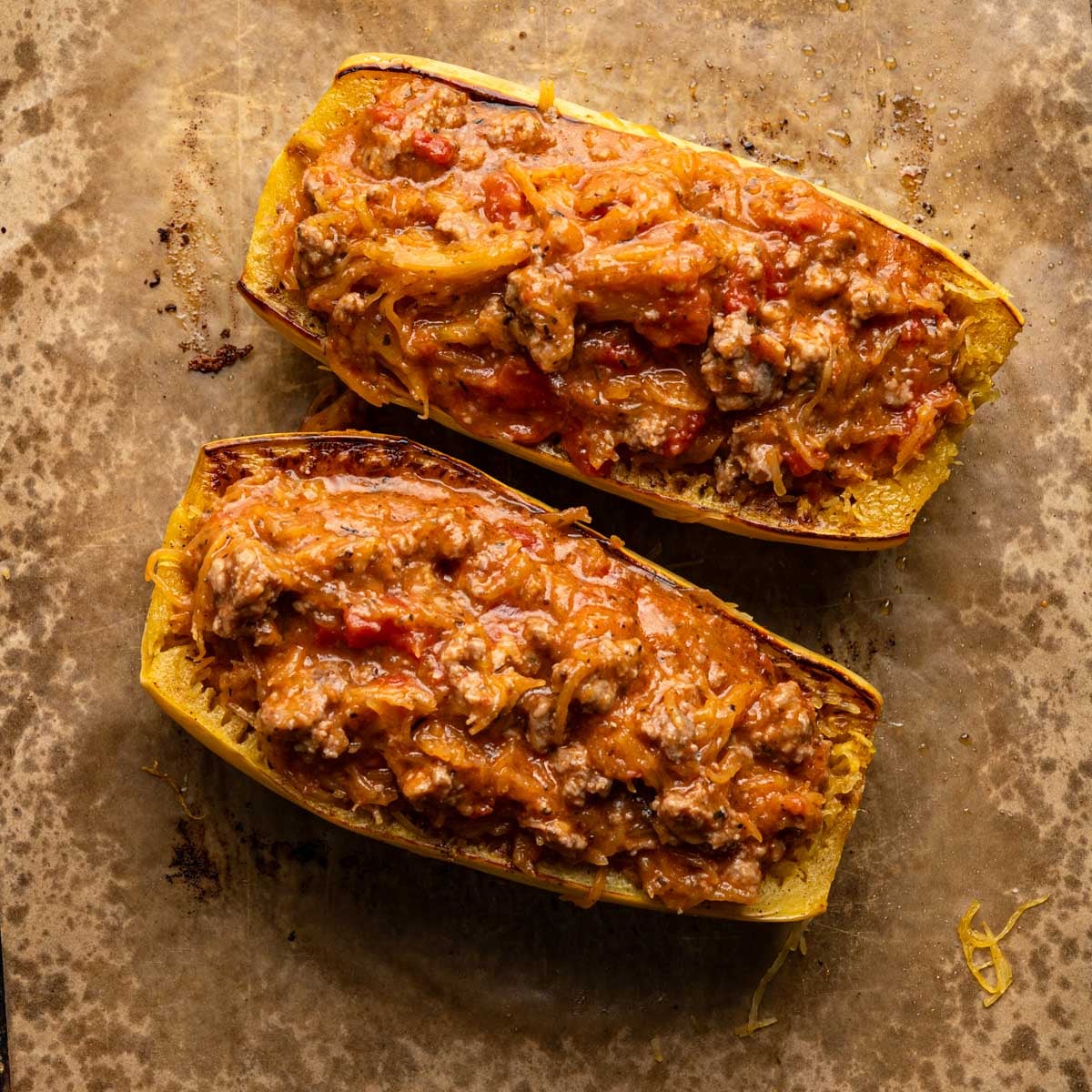 stuffed spaghetti squash halves filled with the Italian turkey sausage mixture before topped with cheese.